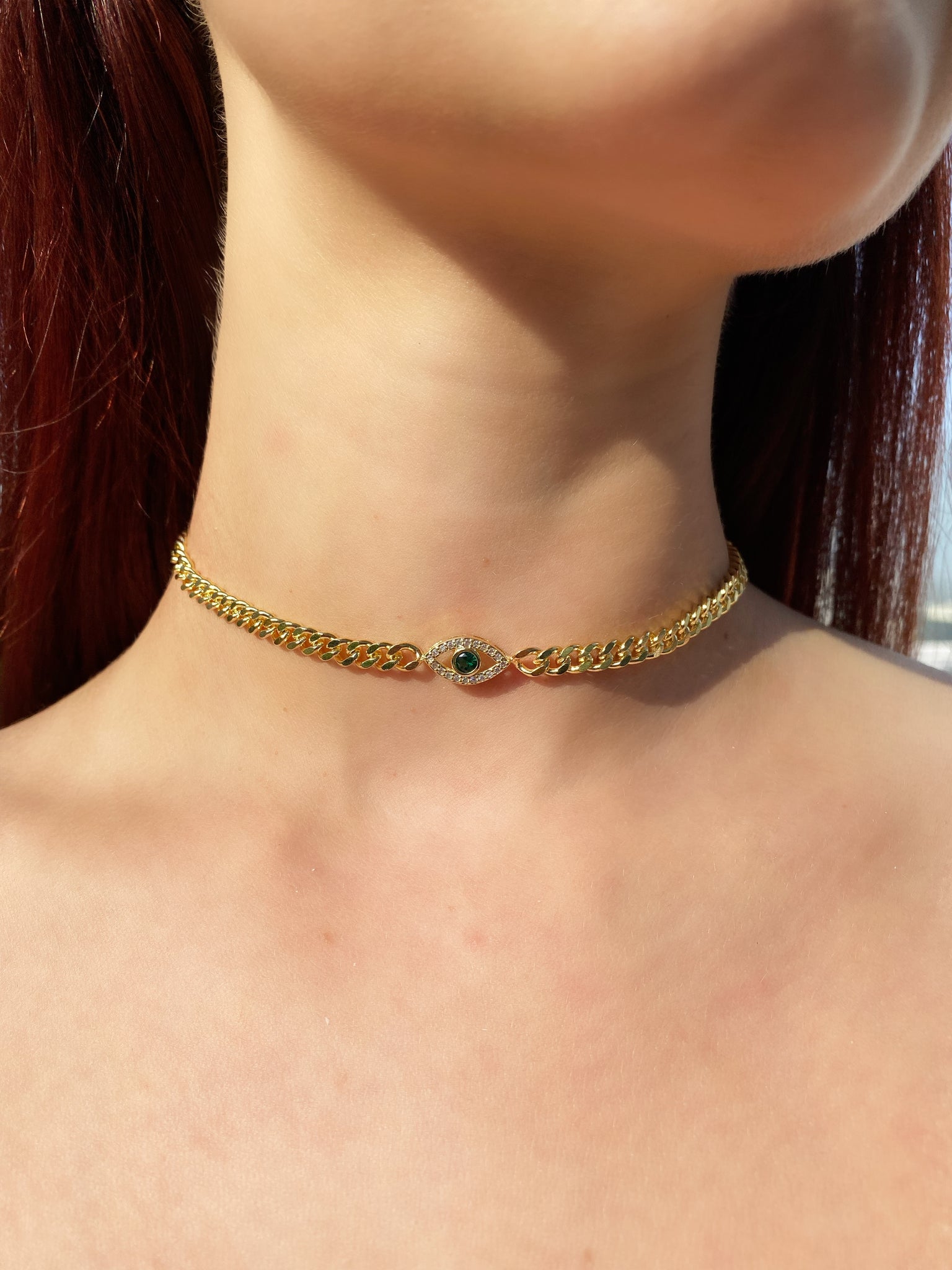 Emerald eye chain choker necklace on model