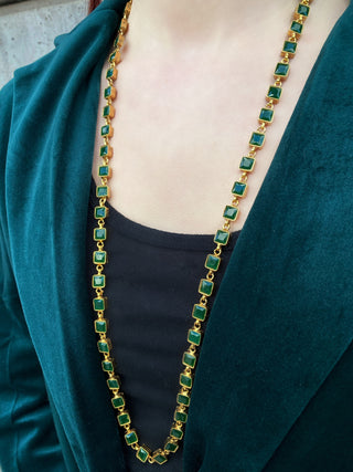 Emerald square necklace on model