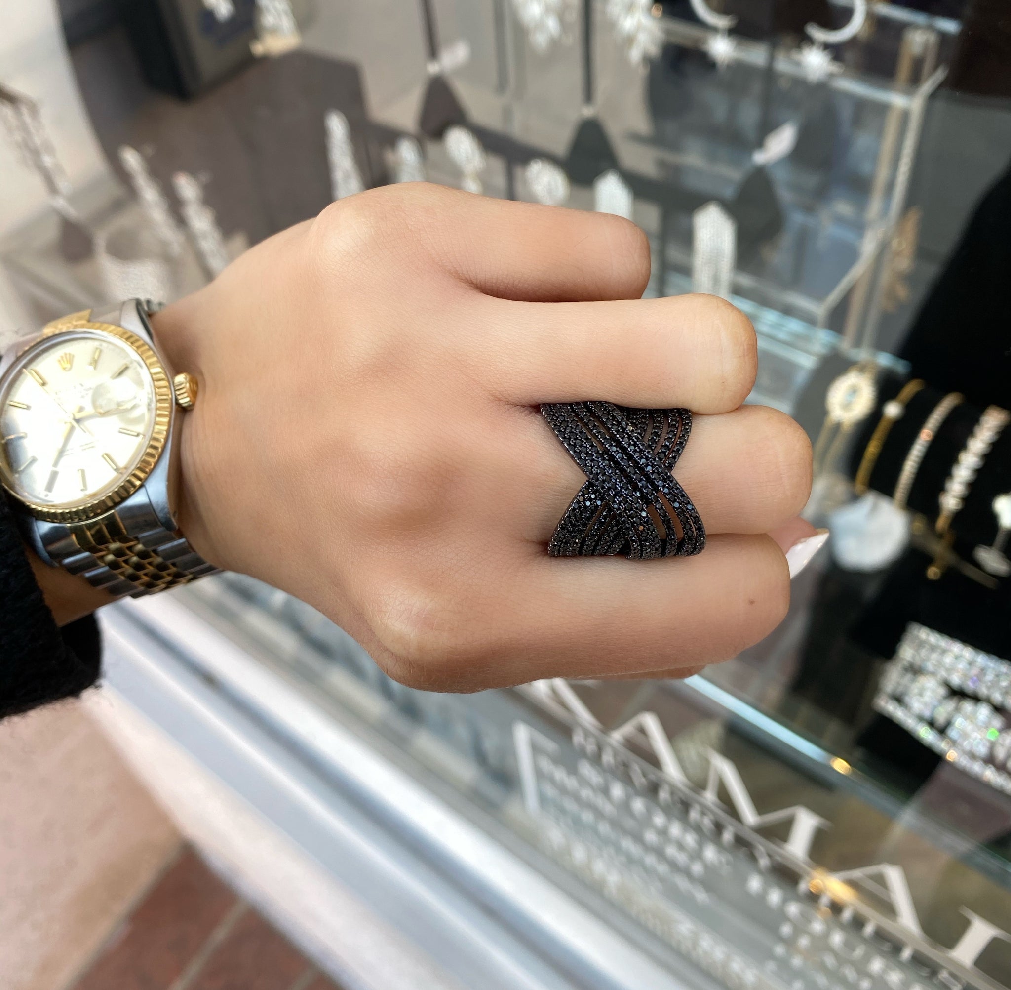 Black pave X ring on model 
