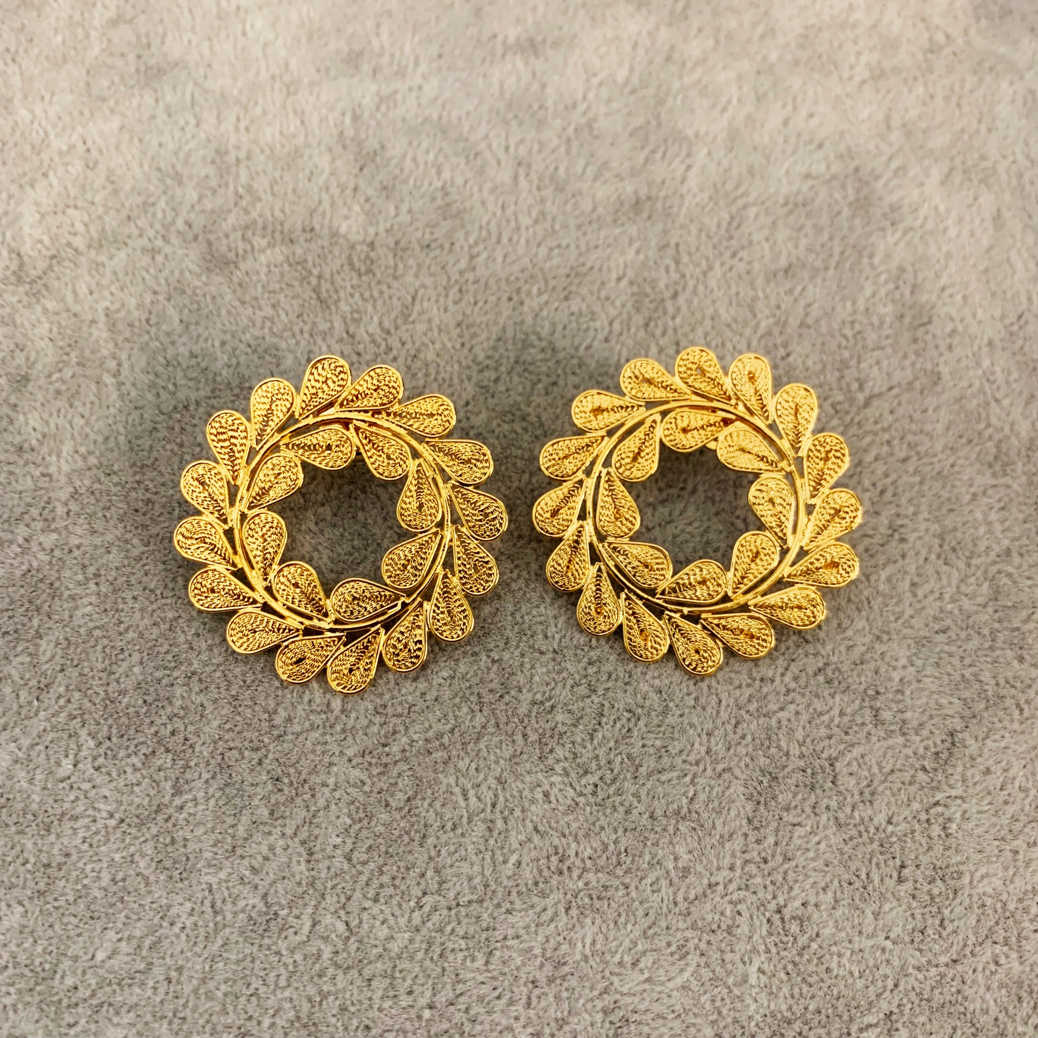 Gold circle leady earrings full view